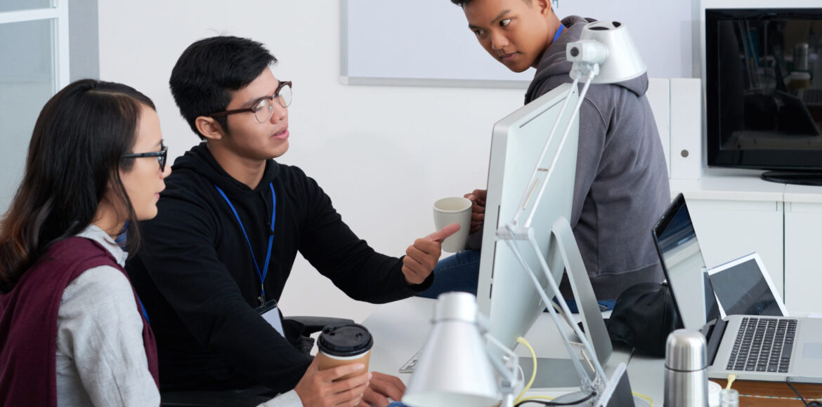 Professional developers discussing ideas for new project