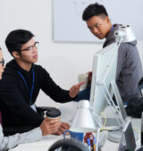 Professional developers discussing ideas for new project