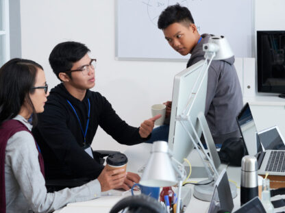 Professional developers discussing ideas for new project