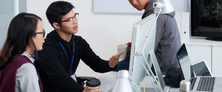 Professional developers discussing ideas for new project